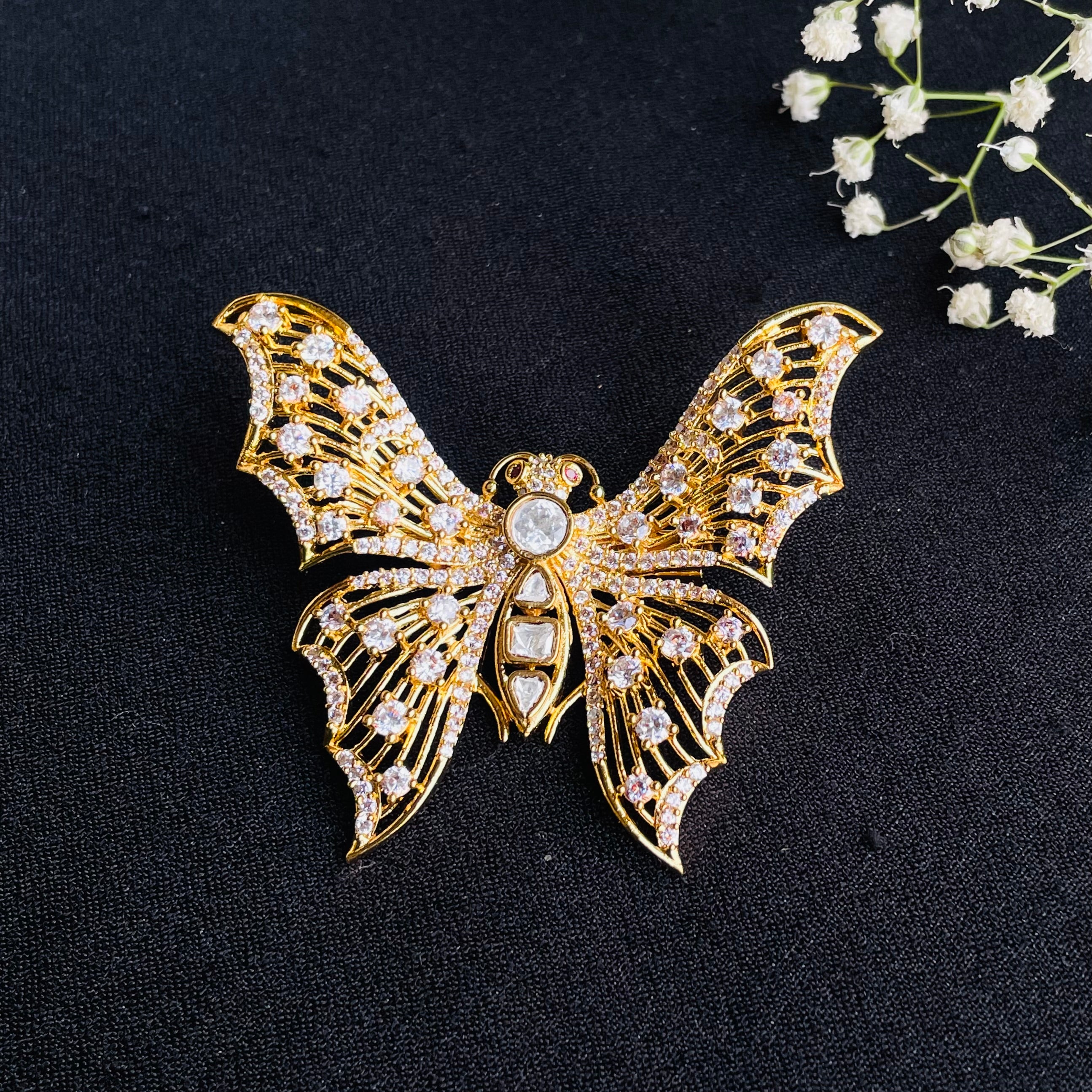 Ad  Zoya brooch