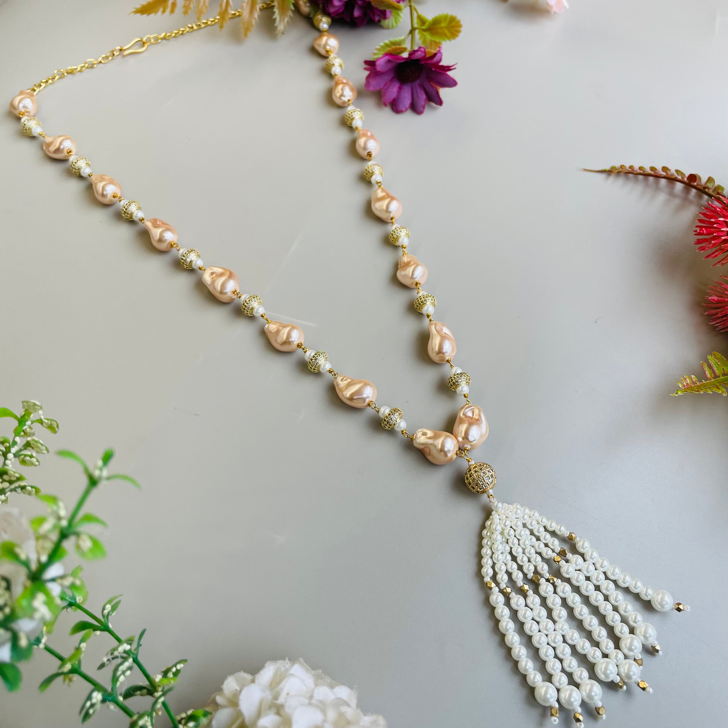 Ad Navya pearl mala