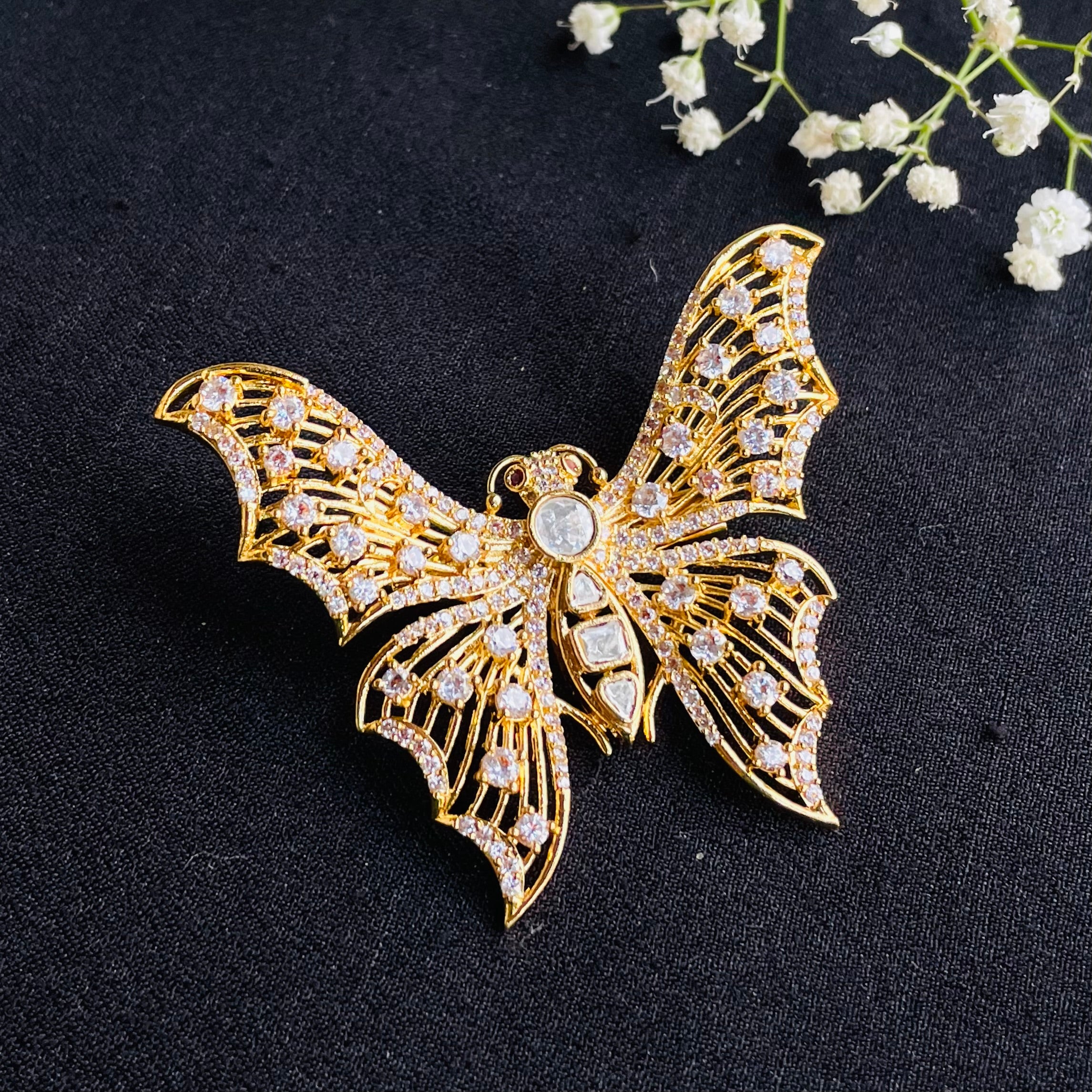 Ad  Zoya brooch